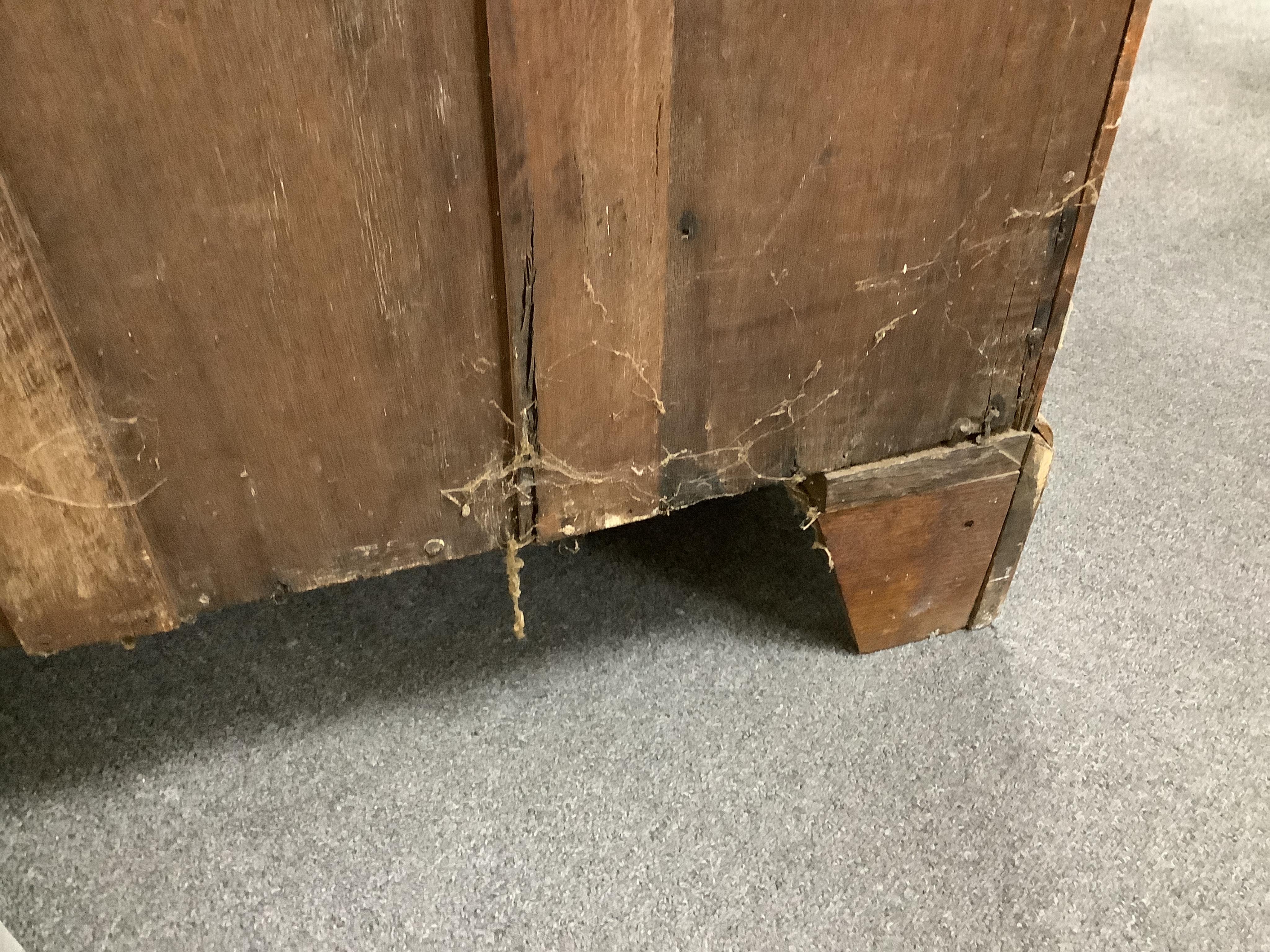 A mid 18th century feather banded walnut concave starburst walnut chest of three drawers, with brushing slide, width 108cm, depth 54cm, height 92cm